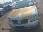 ✅ 2004 Nissan Sentra S • VIN: 3N1CB51DX4L884191 • Lot: 42883640. Wystawiony na IAAI z przebiegiem 161 450 mil. Bezpłatny archiwum sprzedaży aukcyjnych z USA i szczegółowy raport historii pojazdu na DreamBid. Zdjęcie 5.