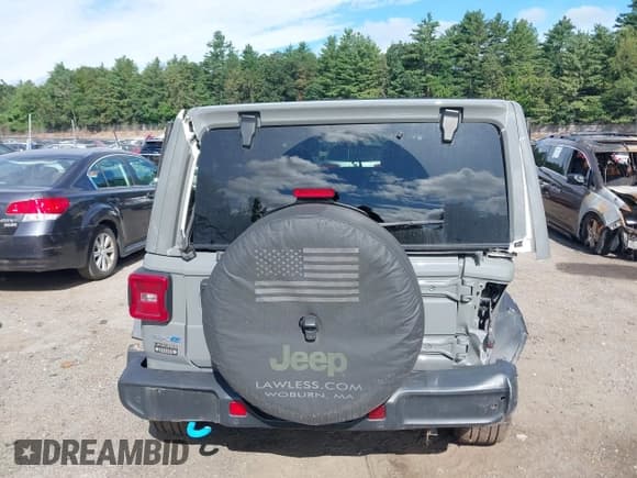 ✅ 2023 Jeep Wrangler Sahara • VIN: 1C4JJXP64PW568165 • Lot: 42740617. Listed on IAAI with 86,559 mi. Free auction sales archive from the USA and detailed vehicle history report at DreamBid. Image 17.