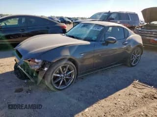 ✅ 2017 Mazda MX-5 Miata Grand Touring • VIN: JM1NDAM74H0102159 • Лот: 90702965. Опубликован ранее на Copart с пробегом 61 609 миль. Бесплатный доступ к архиву аукционных продаж из США и подробный отчёт об истории автомобиля на DreamBid. Изображение 1.