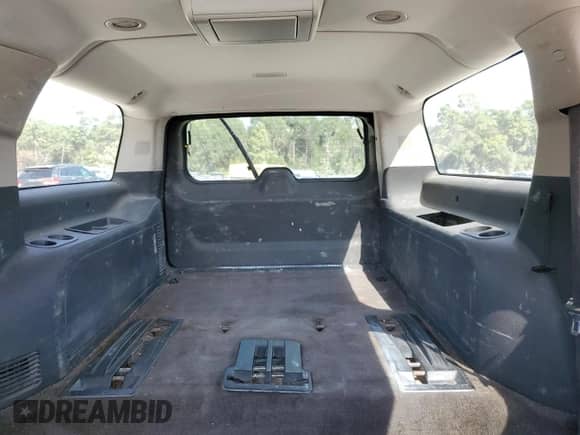 2013 Chevrolet Suburban LT с VIN 1GNSKJE79DR169165, выставлен на аукционе Copart как лот 89437395 с пробегом 314 051 миль миль и Списание • Salvage title. История ставок и продаж доступна на DreamBid. Изображение 10.