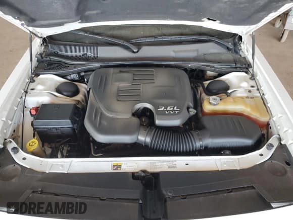 ✅ 2013 Dodge Challenger SXT • VIN: 2C3CDYAG8DH648784 • Lot: 92084445. Wystawiony na Copart z przebiegiem 106 855 mil. Bezpłatny archiwum sprzedaży aukcyjnych z USA i szczegółowy raport historii pojazdu na DreamBid. Zdjęcie 11.