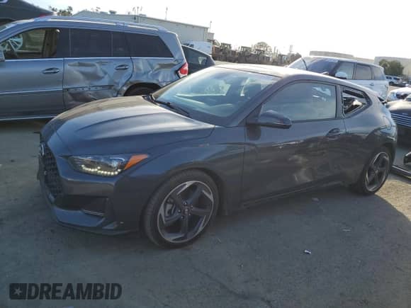 2019 Hyundai Veloster Turbo with VIN KMHTH6AB0KU009779, listed as a Copart auction lot 43198675 with 64,041 mi miles and Salvage title. Bid and sale history available at DreamBid. Image 1.