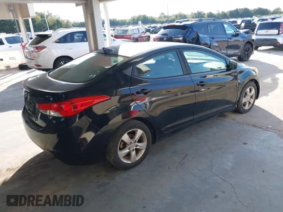 ✅ 2012 Hyundai Elantra GLS • VIN: 5NPDH4AE1CH140707 • Lot: 43661639. Listed on IAAI with 256,794 mi. Free auction sales archive from the USA and detailed vehicle history report at DreamBid. Image 4.