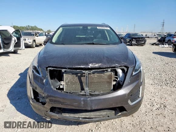 ✅ 2017 Cadillac XT5 Premium Luxury FWD • VIN: 1GYKNCRS8HZ319082 • Лот: 85400215. Опубликован ранее на Copart с пробегом 79 136 миль. Бесплатный доступ к архиву аукционных продаж из США и подробный отчёт об истории автомобиля на DreamBid. Изображение 5.