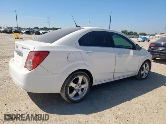 2012 Chevrolet Sonic LTZ с VIN 1G1JE5SH4C4106592, выставлен на аукционе Copart как лот 85377095 с пробегом 120 403 миль миль и Чистый • Clean title. История ставок и продаж доступна на DreamBid. Изображение 3.