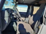 ✅ 2005 Jeep Wrangler Unlimited • VIN: 1J4FA44SX5P342719 • Лот: 84007275. Опубликован ранее на Copart с пробегом 171 614 миль. Бесплатный доступ к архиву аукционных продаж из США и подробный отчёт об истории автомобиля на DreamBid. Изображение 7.