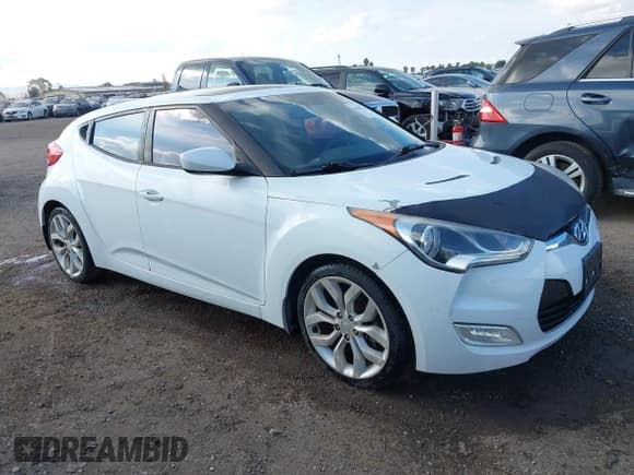 ✅ 2013 Hyundai Veloster w/Black Int • VIN: KMHTC6AD4DU162653 • Lot: 43849738. Wystawiony na IAAI z przebiegiem 178 593 mil. Bezpłatny archiwum sprzedaży aukcyjnych z USA i szczegółowy raport historii pojazdu na DreamBid. Zdjęcie 1.