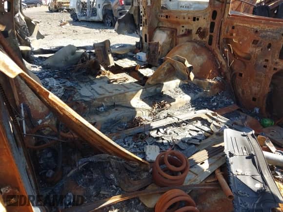 2005 Chevrolet Tahoe LT with VIN 1GNEC13T35R103223, listed as a IAAI auction lot 42165644 with Not provided miles and . Bid and sale history available at DreamBid. Image 8.