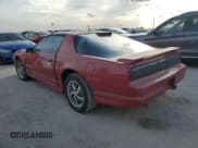 ✅ 1986 Pontiac Firebird Trans Am • VIN: 1G2FW87H0GL249284 • Lot: 76317174. Listed on Copart with 142,505 mi. Free auction sales archive from the USA and detailed vehicle history report at DreamBid. Image 2.