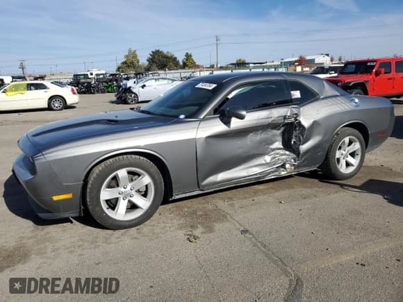 ✅ 2012 Dodge Challenger SXT • VIN: 2C3CDYAG0CH228029 • Lot: 77434704. Wystawiony na Copart z przebiegiem 133 272 mil. Bezpłatny archiwum sprzedaży aukcyjnych z USA i szczegółowy raport historii pojazdu na DreamBid. Zdjęcie 1.