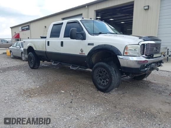 ✅ 2003 Ford F-350 XL • VIN: 1FTSW31P23ED37930 • Lot: 42341869. Listed on IAAI with 313,413 mi. Free auction sales archive from the USA and detailed vehicle history report at DreamBid. Image 1.