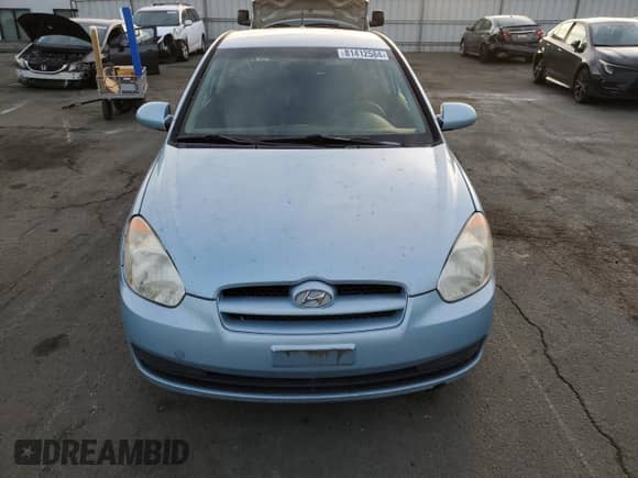 2007 Hyundai Accent GS z VIN KMHCM36C17U051588, wystawiony jako Copart lot #81412584 z przebiegiem 217 625 mil mil oraz Czysty tytuł • Clean title. Historia ofert i sprzedaży dostępna na DreamBid. Obrazek 5.