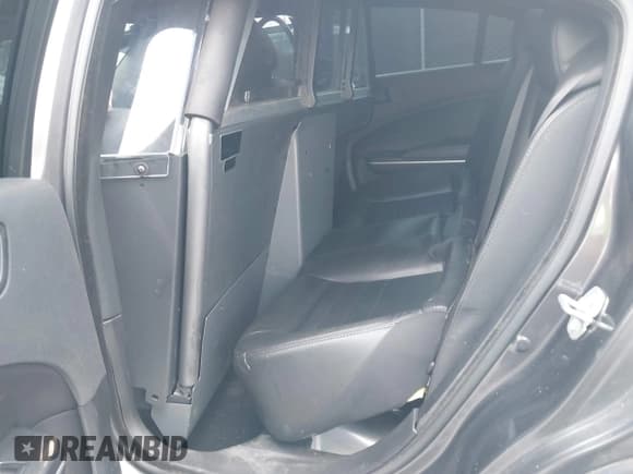 ✅ 2021 Dodge Charger Police • VIN: 2C3CDXAT5MH569693 • Lot: 42568625. Listed on IAAI with 77,451 mi. Free auction sales archive from the USA and detailed vehicle history report at DreamBid. Image 8.