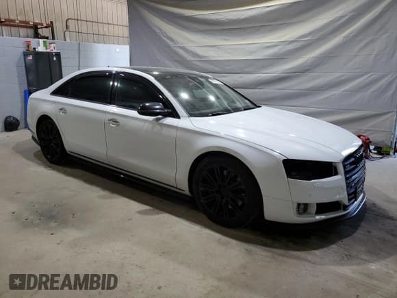 ✅ 2015 Audi A8 3.0T • VIN: WAU3GAFDXFN018250 • Lot: 69765065. Wystawiony na Copart z przebiegiem 151 075 mil. Bezpłatny archiwum sprzedaży aukcyjnych z USA i szczegółowy raport historii pojazdu na DreamBid. Zdjęcie 4.