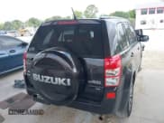 ✅ 2013 Suzuki Grand Vitara Limited • VIN: JS3TD0D75D4100331 • Lot: 42146459. Listed on IAAI with 133,359 mi. Free auction sales archive from the USA and detailed vehicle history report at DreamBid. Image 4.