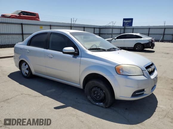 ✅ 2011 Chevrolet Aveo 1LT • VIN: KL1TD5DE7BB181438 • Lot: 54189605. Wystawiony na Copart z przebiegiem 201 215 mil. Bezpłatny archiwum sprzedaży aukcyjnych z USA i szczegółowy raport historii pojazdu na DreamBid. Zdjęcie 4.