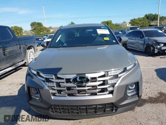 2022 Hyundai Santa Cruz SE with VIN 5NTJA4AE1NH008896, listed as a IAAI auction lot 41444400 with 23,547 mi miles and . Bid and sale history available at DreamBid. Image 12.