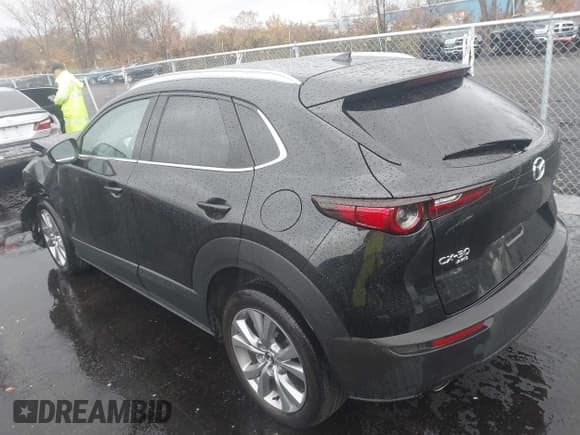 ✅ 2022 Mazda CX-30 S Premium • VIN: 3MVDMBDL8NM418654 • Lot: 43576216. Listed on IAAI with 40,256 mi. Free auction sales archive from the USA and detailed vehicle history report at DreamBid. Image 3.