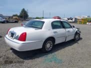 ✅ 2001 Lincoln Continental • VIN: 1LN8M82W11Y694879 • Lot: 42313003. Wystawiony na IAAI z przebiegiem Nie podano. Bezpłatny archiwum sprzedaży aukcyjnych z USA i szczegółowy raport historii pojazdu na DreamBid. Zdjęcie 4.