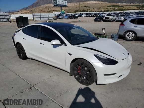 ✅ 2021 Tesla Model 3 Performance • VIN: 5YJ3E1EC7MF001211 • Lot: 84995295. Listed on Copart with 104,922 mi. Free auction sales archive from the USA and detailed vehicle history report at DreamBid. Image 4.