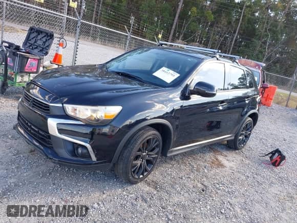 2016 Mitsubishi Outlander SE with VIN JA4AP3AW3GZ034485, listed as a IAAI auction lot 38412795 with 133,009 mi miles and . Bid and sale history available at DreamBid. Image 2.
