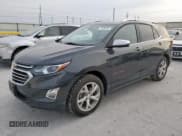 ✅ 2020 Chevrolet Equinox Premier • VIN: 3GNAXNEV4LS630996 • Lot: 71679115. Listed on Copart with 84,487 mi. Free auction sales archive from the USA and detailed vehicle history report at DreamBid. Image 1.