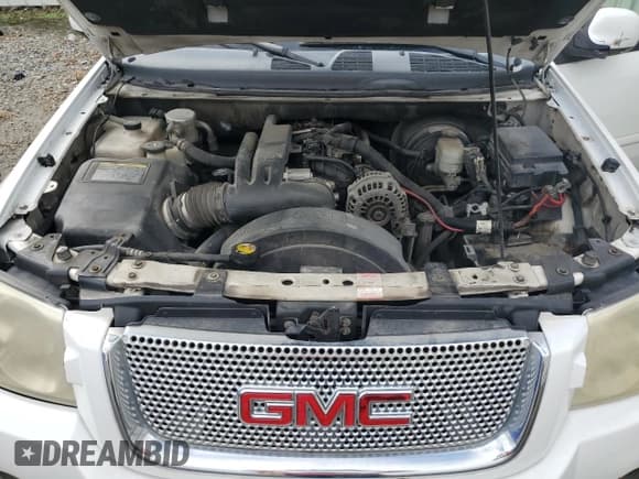 ✅ 2007 GMC Envoy Denali • VIN: 1GKET63M072240182 • Lot: 85186765. Listed on Copart with 210,752 mi. Free auction sales archive from the USA and detailed vehicle history report at DreamBid. Image 12.