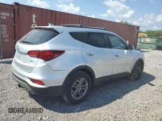 ✅ 2018 Hyundai Santa Fe 2.4L • VIN: 5XYZU3LB2JG561483 • Лот: 60343064. Опубликован ранее на Copart с пробегом 128 845 миль. Бесплатный доступ к архиву аукционных продаж из США и подробный отчёт об истории автомобиля на DreamBid. Изображение 3.