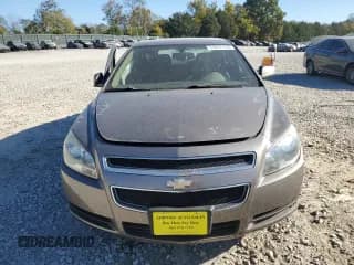 ✅ 2012 Chevrolet Malibu 1LS • VIN: 1G1ZB5E03CF260278 • Lot: 77217114. Listed on Copart with 148,952 mi. Free auction sales archive from the USA and detailed vehicle history report at DreamBid. Image 5.