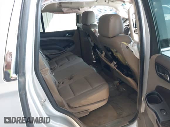 2015 Chevrolet Tahoe LT with VIN 1GNSCBKC2FR500868, listed as a IAAI auction lot 43368598 with 212,885 mi miles and . Bid and sale history available at DreamBid. Image 8.