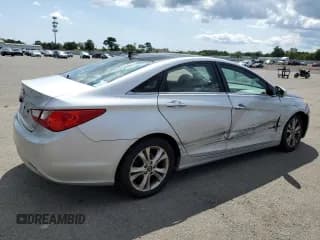 ✅ 2013 Hyundai Sonata SE • VIN: 5NPEC4AC5DH597202 • Lot: 68055054. Listed on Copart with 112,196 mi. Free auction sales archive from the USA and detailed vehicle history report at DreamBid. Image 3.
