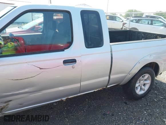 ✅ 2001 Nissan Frontier XE • VIN: 1N6DD26SX1C333734 • Lot: 42376797. Listed on IAAI with 148,577 mi. Free auction sales archive from the USA and detailed vehicle history report at DreamBid. Image 14.
