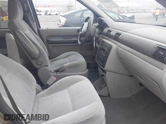 ✅ 2004 Ford Freestar SE • VIN: 2FMZA51674BA62080 • Lot: 43188329. Wystawiony na IAAI z przebiegiem 131 737 mil. Bezpłatny archiwum sprzedaży aukcyjnych z USA i szczegółowy raport historii pojazdu na DreamBid. Zdjęcie 5.