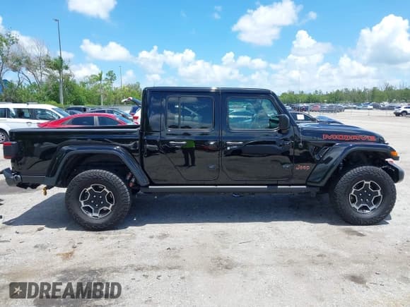 ✅ 2023 Jeep Gladiator Mojave • VIN: 1C6JJTEG8PL545212 • Lot: 42740565. Listed on IAAI with 29,151 mi. Free auction sales archive from the USA and detailed vehicle history report at DreamBid. Image 13.