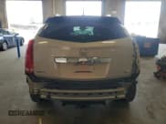 ✅ 2012 Cadillac SRX Premium Collection • VIN: 3GYFNCE33CS511953 • Lot: 67945755. Listed on Copart with 127,564 mi. Free auction sales archive from the USA and detailed vehicle history report at DreamBid. Image 6.