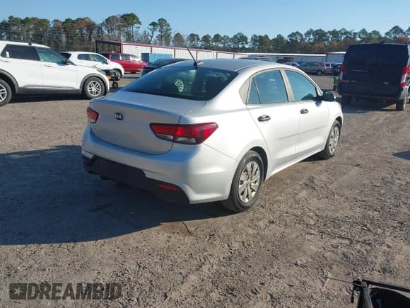 ✅ 2018 Kia Rio S • VIN: 3KPA24AB0JE079409 • Lot: 43753294. Listed on IAAI with 111,953 mi. Free auction sales archive from the USA and detailed vehicle history report at DreamBid. Image 4.