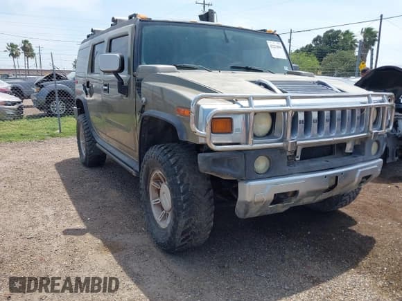 ✅ 2005 Hummer H2 SUV • VIN: 5GRGN23U25H103356 • Lot: 42221866. Wystawiony na IAAI z przebiegiem 194 150 mil. Bezpłatny archiwum sprzedaży aukcyjnych z USA i szczegółowy raport historii pojazdu na DreamBid. Zdjęcie 1.