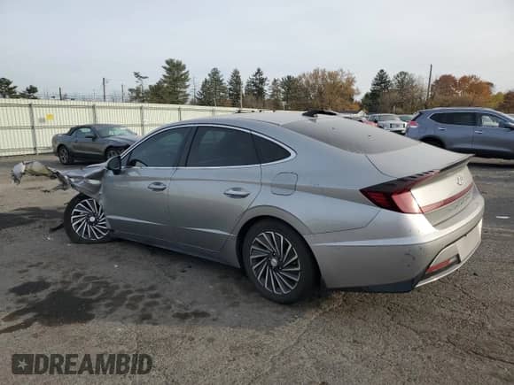 ✅ 2020 Hyundai Sonata Ultimate • VIN: KMHL34JJ2LA010025 • Лот: 77657214. Размещён на Copart с пробегом 59 596 миль миль. Получите бесплатный доступ к архиву аукционных продаж из США и посмотрите подробный отчёт об истории автомобиля на DreamBid. Изображение 2.