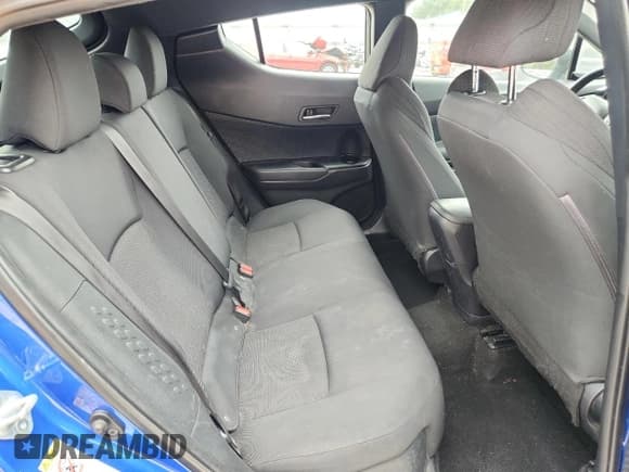 ✅ 2019 Toyota C-HR LE • VIN: NMTKHMBX4KR075561 • Лот: 81630915. Опубликован ранее на Copart с пробегом 79 510 миль. Бесплатный доступ к архиву аукционных продаж из США и подробный отчёт об истории автомобиля на DreamBid. Изображение 11.