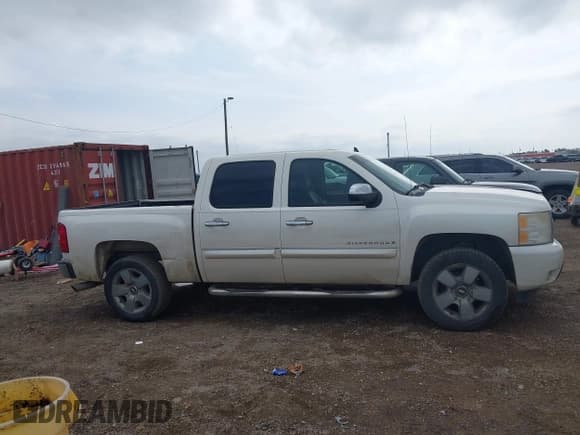 ✅ 2009 Chevrolet Silverado 1500 • VIN: 3GCEC33J79G169282 • Lot: 41387505. Wystawiony na IAAI z przebiegiem 243 182 mil. Bezpłatny archiwum sprzedaży aukcyjnych z USA i szczegółowy raport historii pojazdu na DreamBid. Zdjęcie 13.