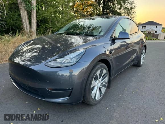 ✅ 2021 Tesla Model Y Standard Range • VIN: 5YJYGDED6MF106087 • Lot: 86439715. Listed on Copart with 19,218 mi. Free auction sales archive from the USA and detailed vehicle history report at DreamBid. Image 2.