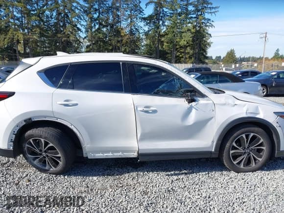 ✅ 2023 Mazda CX-5 S Premium • VIN: JM3KFBDM9P0184985 • Lot: 43461665. Listed on IAAI with 28,282 mi. Free auction sales archive from the USA and detailed vehicle history report at DreamBid. Image 15.