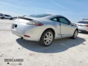 ✅ 2007 Mitsubishi Eclipse SE • VIN: 4A3AK64F17E065689 • Lot: 84571065. Listed on Copart with 150,032 mi. Free auction sales archive from the USA and detailed vehicle history report at DreamBid. Image 3.