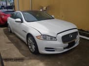 ✅ 2013 Jaguar XJ • VIN: SAJWJ1CD7D8V49599 • Lot: 54008915. Listed on Copart with 133,163 mi. Free auction sales archive from the USA and detailed vehicle history report at DreamBid. Image 1.
