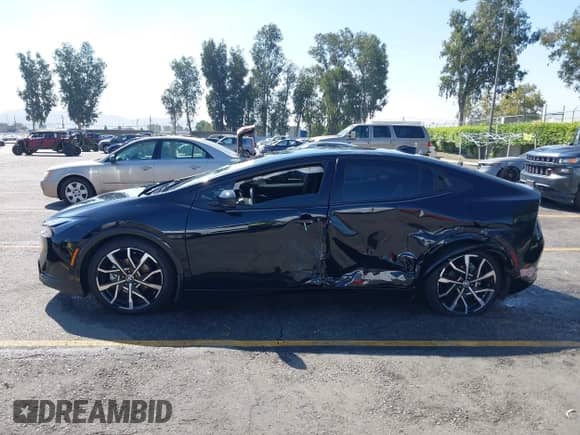 2024 Toyota Prius SE with VIN JTDACACU3R3014793, listed as a IAAI auction lot 43359390 with 22,277 mi miles and . Bid and sale history available at DreamBid. Image 14.