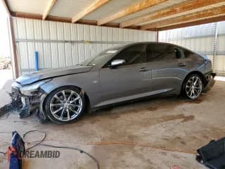 ✅ 2021 Cadillac CT5 Sport • VIN: 1G6DP5RK2M0119725 • Lot: 65816655. Wystawiony na Copart z przebiegiem 73 853 mil. Bezpłatny archiwum sprzedaży aukcyjnych z USA i szczegółowy raport historii pojazdu na DreamBid. Zdjęcie 1.