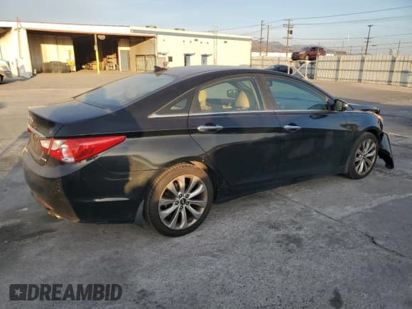 ✅ 2012 Hyundai Sonata SE • VIN: 5NPEC4AB6CH408594 • Lot: 91305435. Listed on Copart with 122,086 mi. Free auction sales archive from the USA and detailed vehicle history report at DreamBid. Image 3.