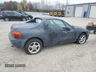 ✅ 1993 Honda del Sol Si • VIN: JHMEH6261PS015588 • Лот: 79341404. Опубликован ранее на Copart с пробегом 154 164 миль. Бесплатный доступ к архиву аукционных продаж из США и подробный отчёт об истории автомобиля на DreamBid. Изображение 3.