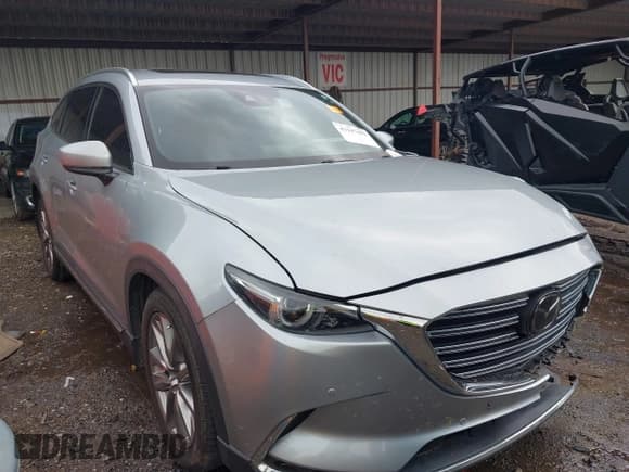 ✅ 2020 Mazda CX-9 Grand Touring • VIN: JM3TCADY4L0419801 • Lot: 43107099. Listed on IAAI with 61,318 mi. Free auction sales archive from the USA and detailed vehicle history report at DreamBid. Image 1.