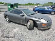 ✅ 2003 Mitsubishi Eclipse RS • VIN: 4A3AC34G63E029902 • Lot: 54668075. Listed on Copart with 156,912 mi. Free auction sales archive from the USA and detailed vehicle history report at DreamBid. Image 4.